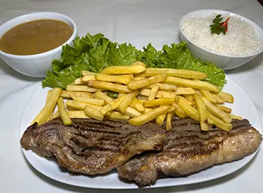 Restaurante da Gi - Pratos típicos da comida mineira em Monte Verde, como feijão-tropeiro e costelinha mineira